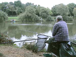 a match angler fishing Upper Dark Lane Pond