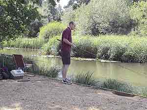 a specimen angler fishing Mopley Pond